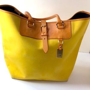 Dooney & Bourke  canvas with leather trimming inside and outside